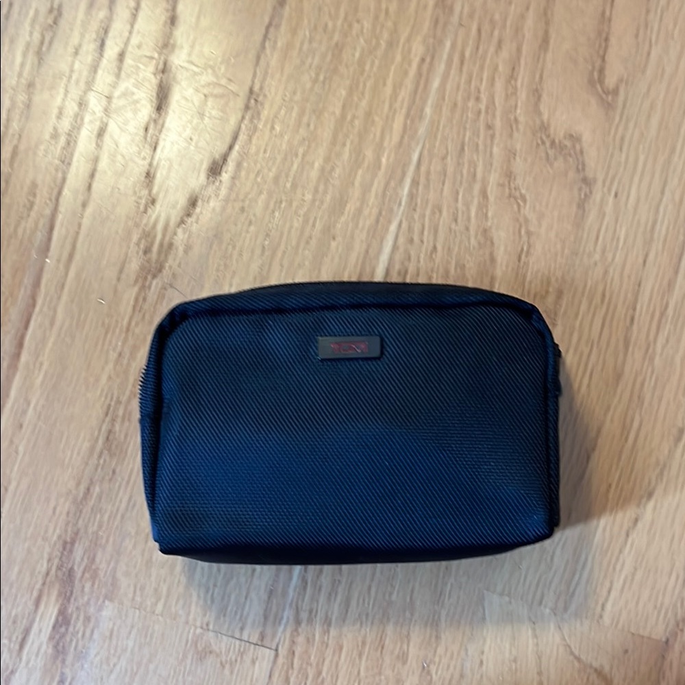 Tumi for Delta small black bag with sleep mask and socks
